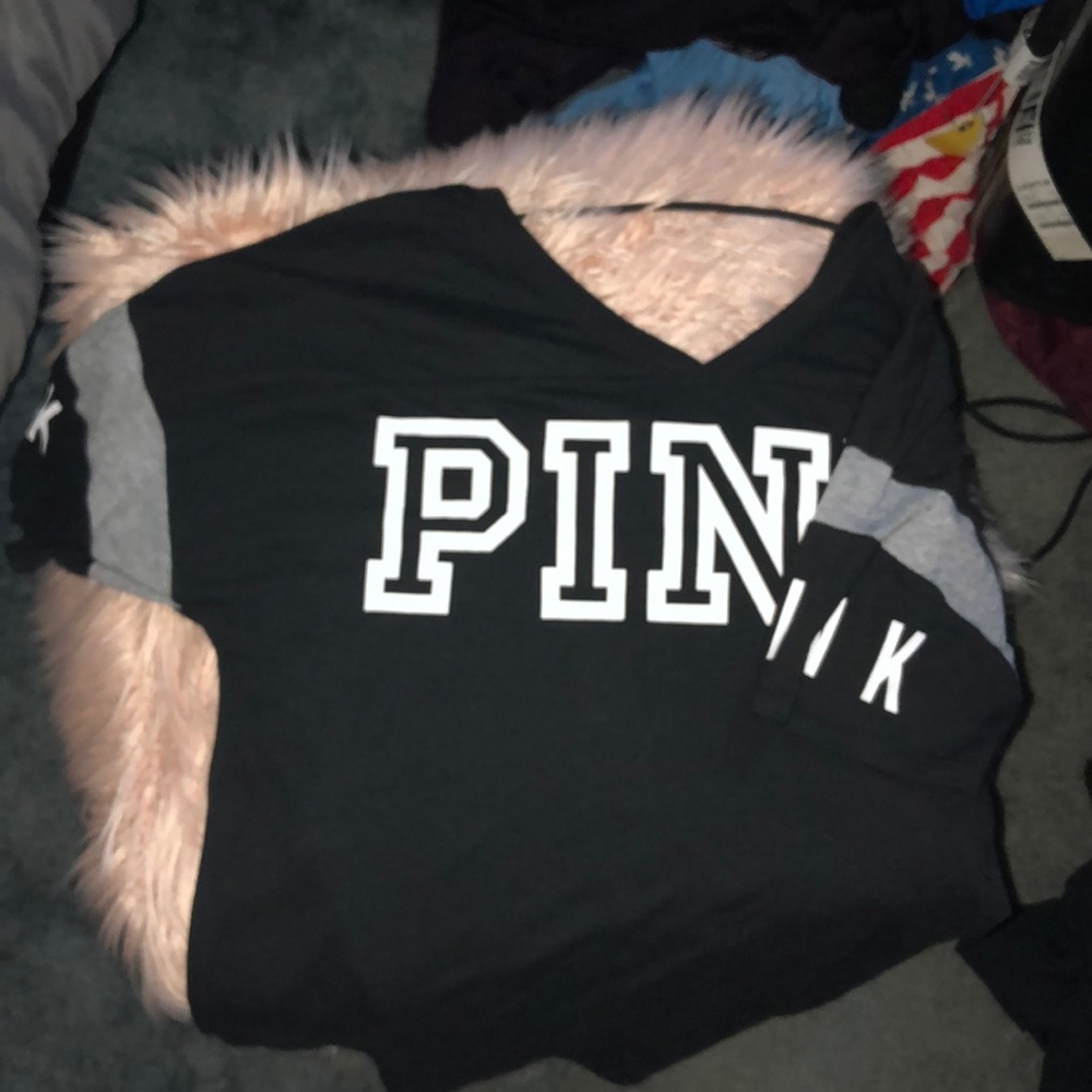 Pink short sleeve shirt with low back